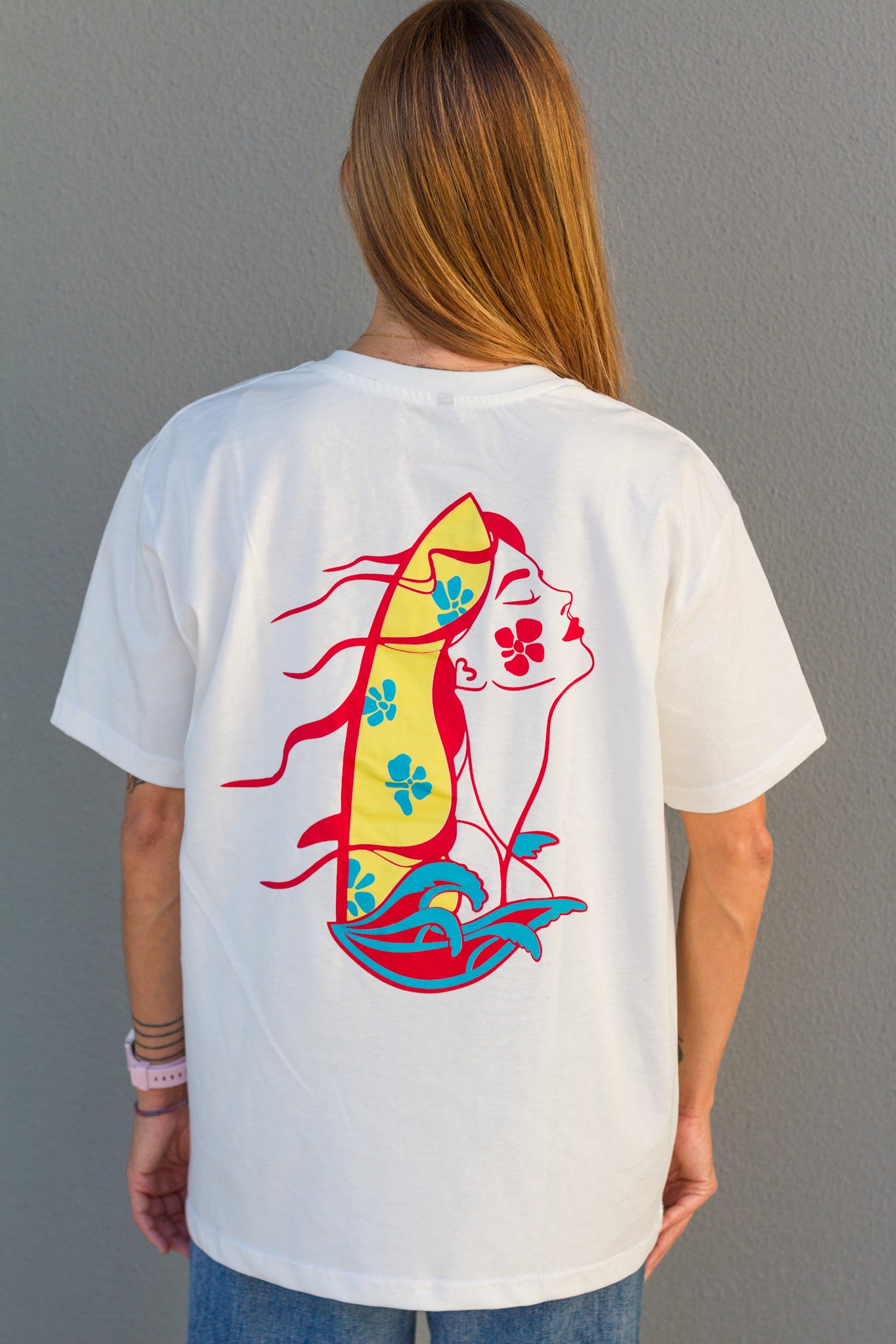 Sevi Waves Elysian Wave T-Shirt featuring a vibrant wave design on soft fabric, casual fit, and stylish coastal-inspired print.