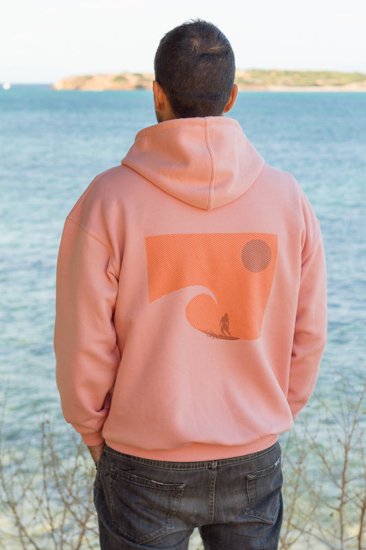 Salmon hoodie with a statement ocean wave and sunset graphic from the Sevi Waves collection.