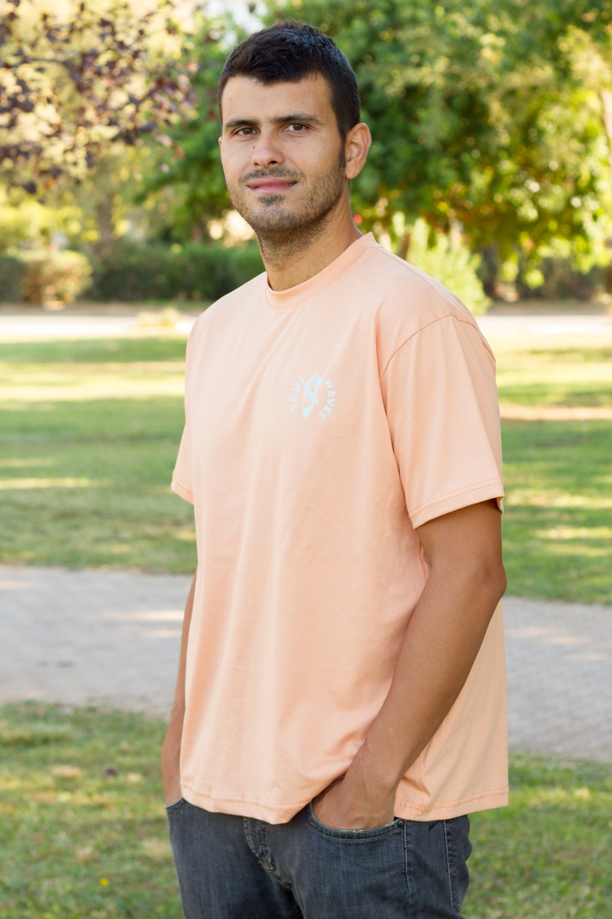 Sevi Waves peach oversized tshirt styled in a casual streetwear look.