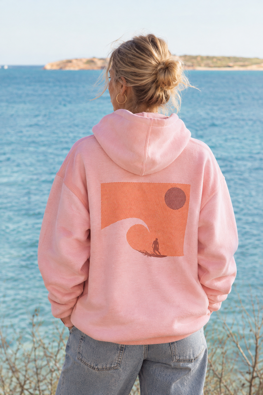 TIDE SHIFT FW26/27 salmon hoodie with a bold big wave at sunset graphic by Sevi Waves.
